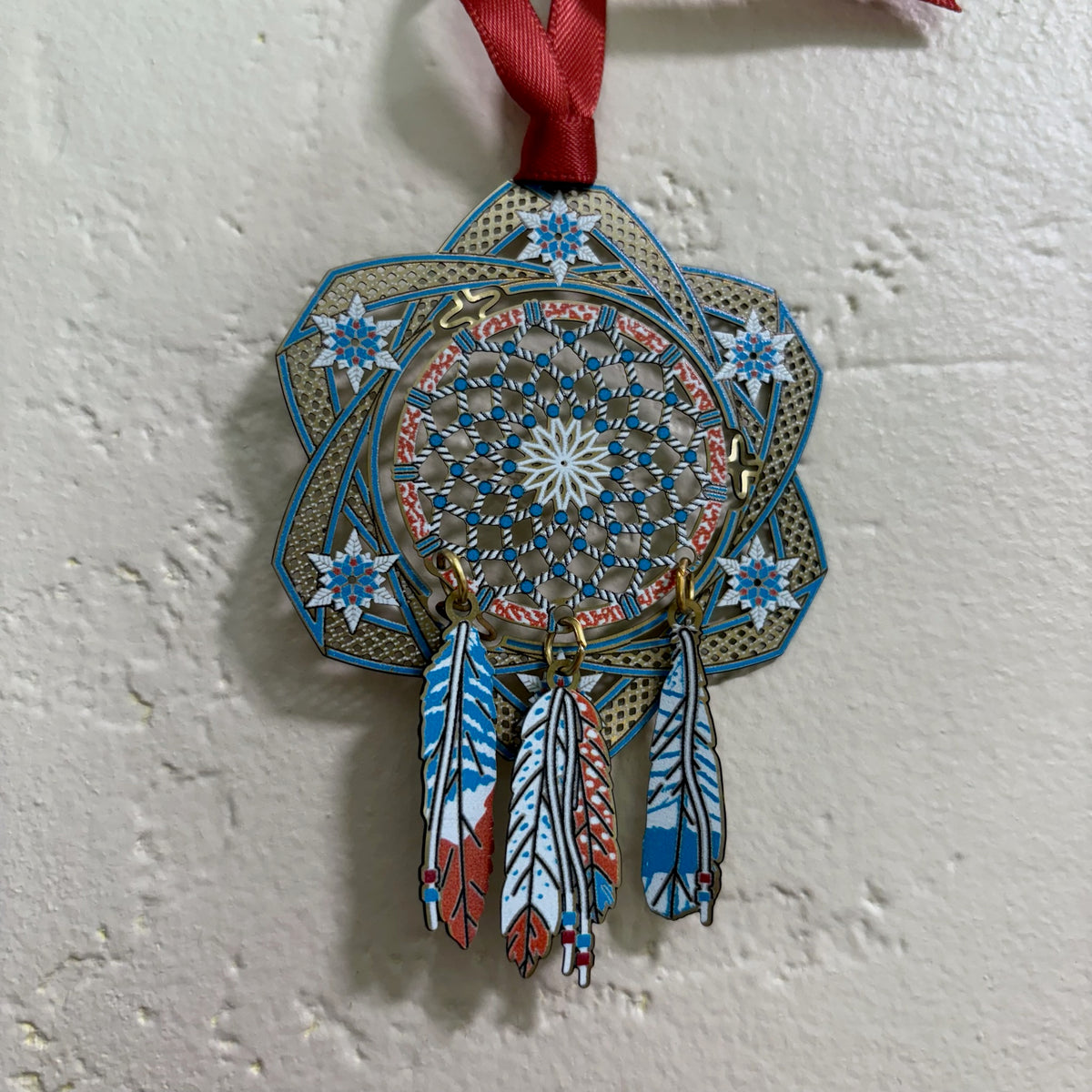 Dream Catcher Holiday Ornament against white stucco backdrop For Sale Online 