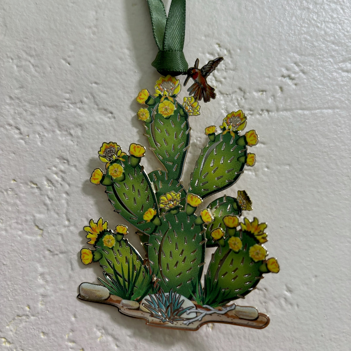 Flowering Prickly Pear Holiday Ornament against white stucco backdrop For Sale Online