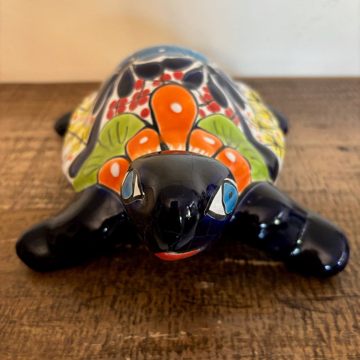 Frontal view deep Royal Blue hand-painted Talavera ceramic turtle pottery from Mexico. Available for purchase through online sale.