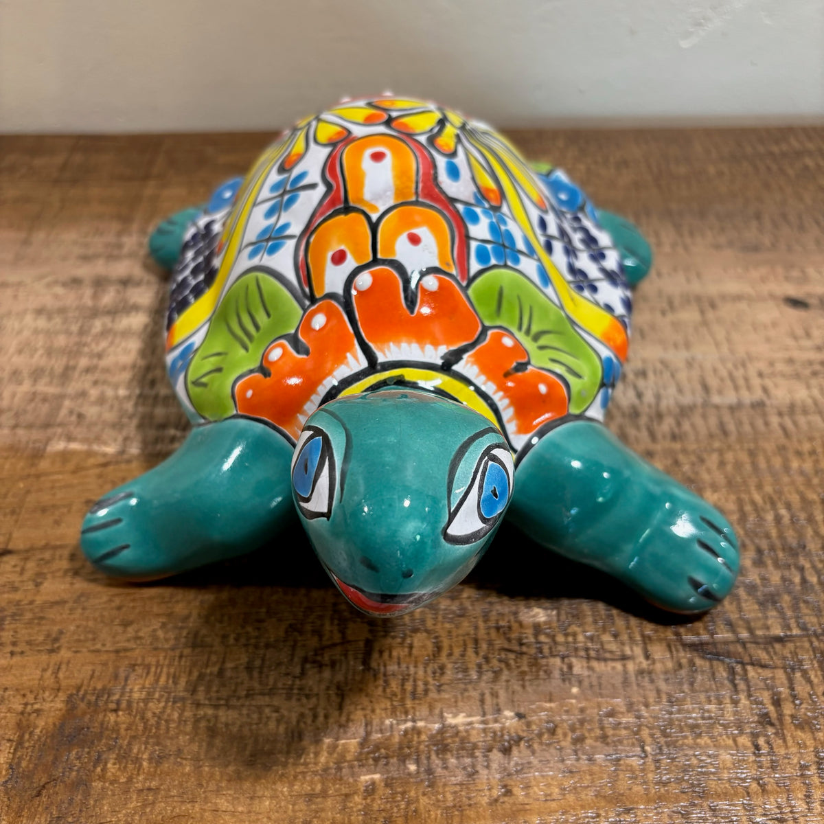 Frontal view Turquoise Hand-made and Hand-painted Turtle Talavera figurines from Mexico for sale online.