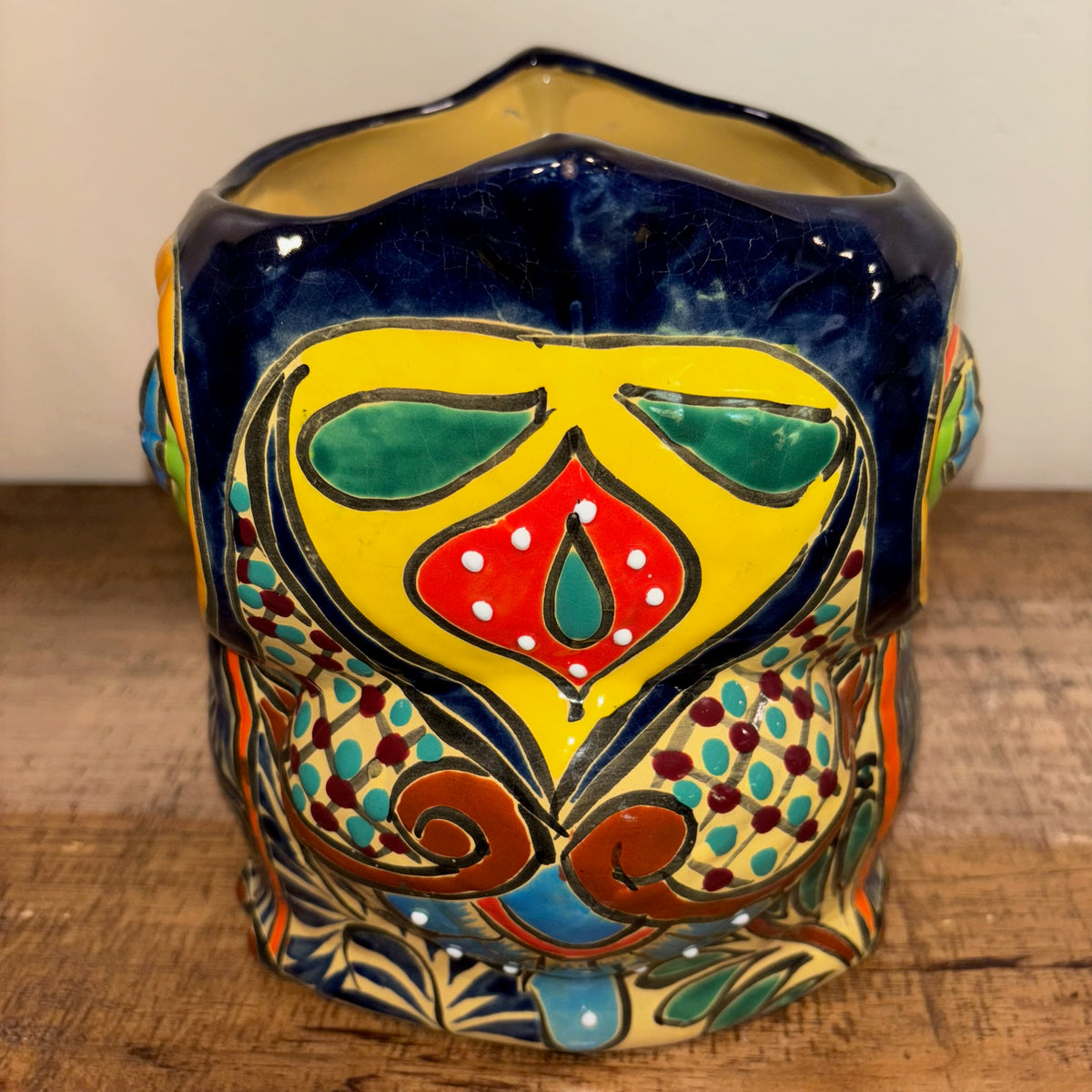 Side view Hand-made Hand-painted colorful blue Owl Talavera pottery from Mexico for sale online. 