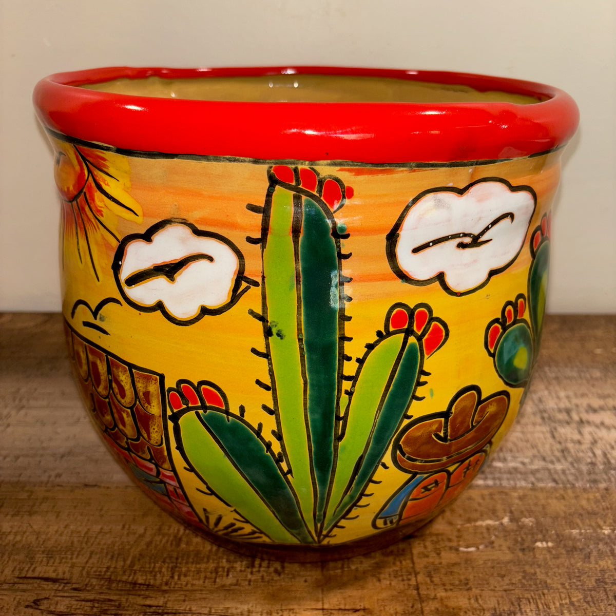 Hand-made Hand-painted colorful Ranchero Talavera pottery, cactus design with casita and sleeping cowboy, from Mexico, for sale online.