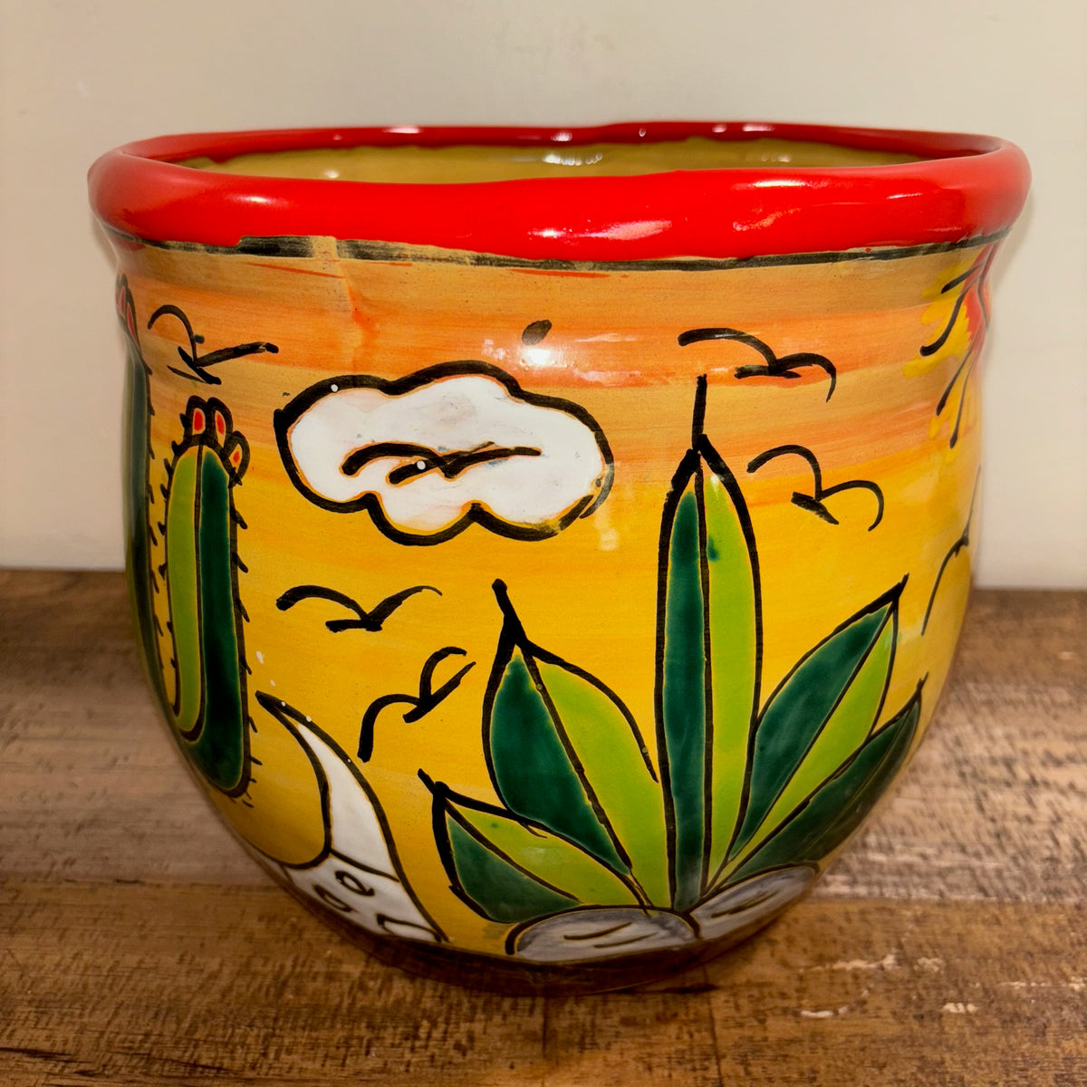 Hand-made Hand-painted colorful Talavera pottery Catus design with cow skull and cloud, from Mexico for sale online.